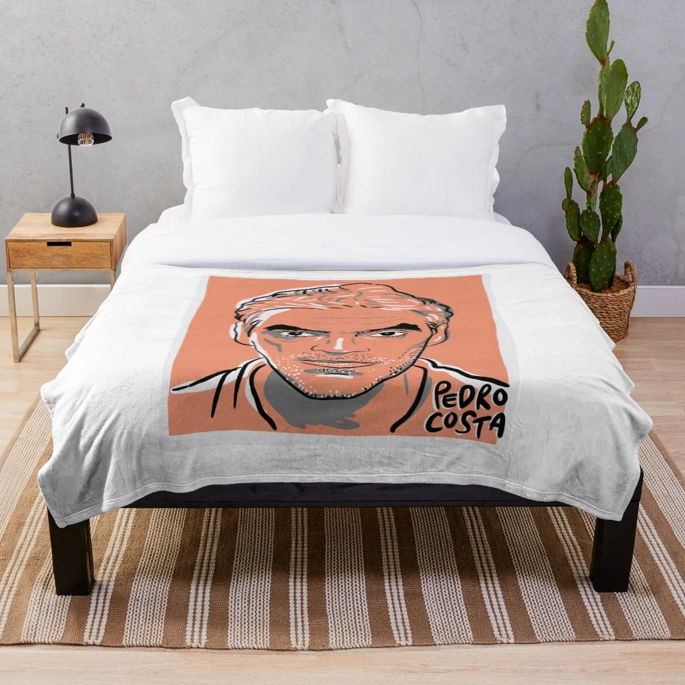 Soft, plush blanket featuring the iconic work of filmmaker Pedro Costa