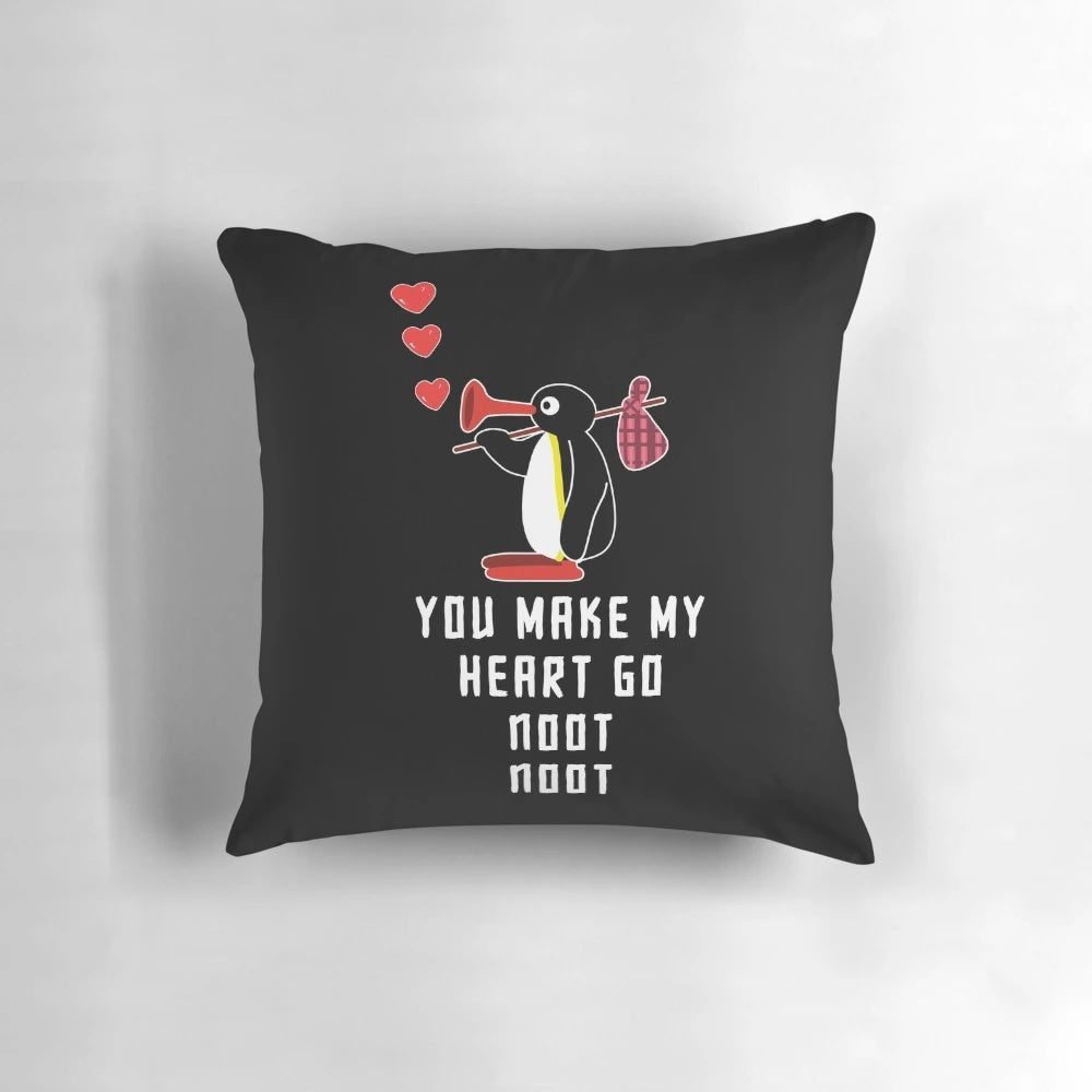 Soft, plush penguin-themed pillow with "noot noot" design, perfect for Pingu fans and home decor.