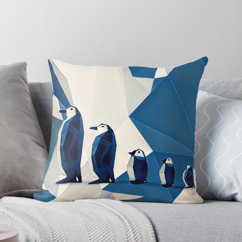 A plush, geometric penguin-shaped pillow with a white and blue color scheme, perfect for adding a touch of ocean-inspired style to your living space.