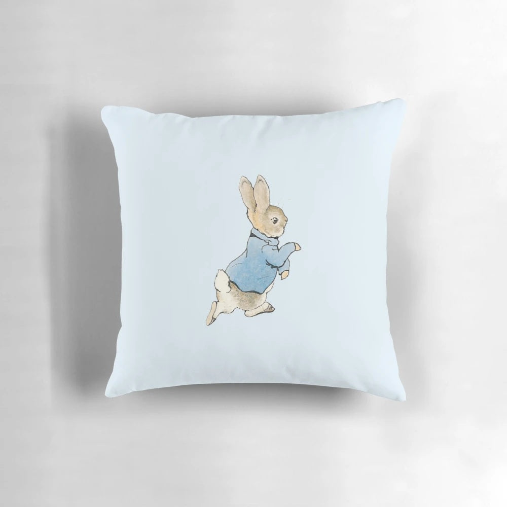 Plush Peter Rabbit-themed pillow in neutral colors