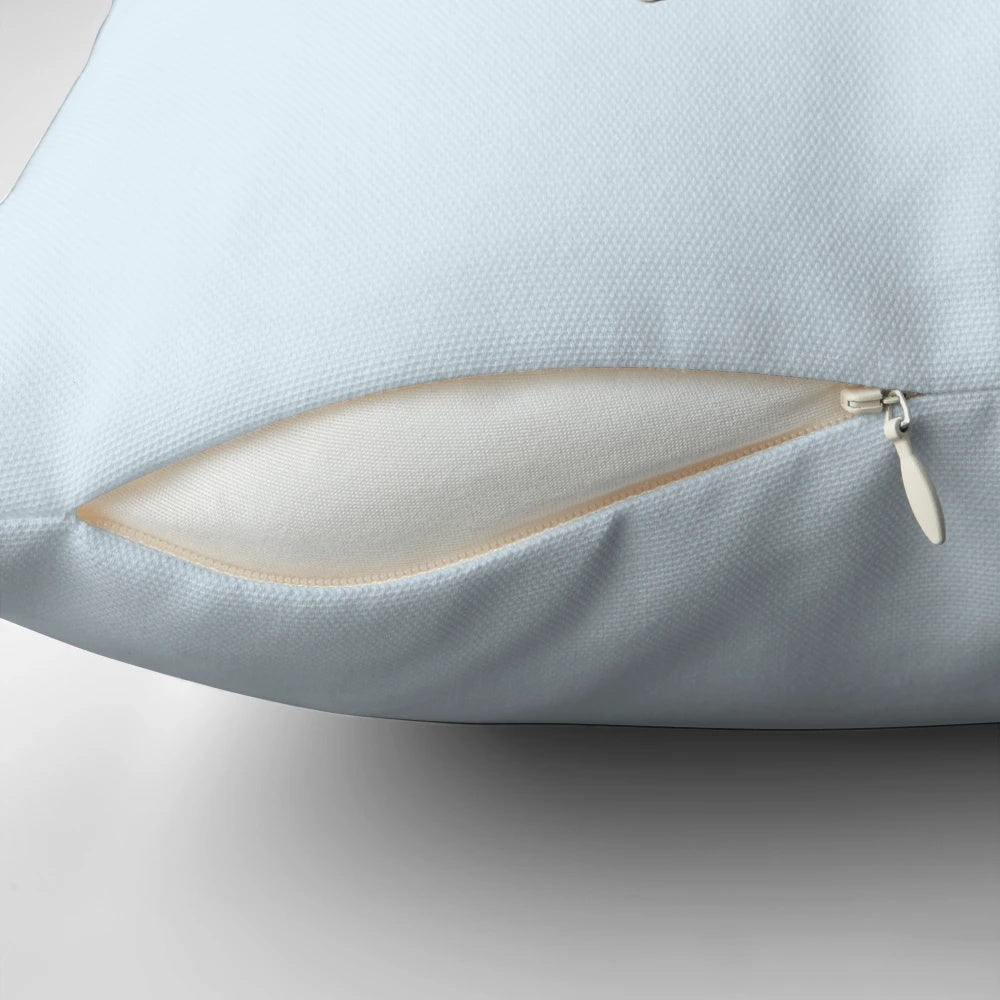 Plush Peter Rabbit-themed pillow in neutral colors
