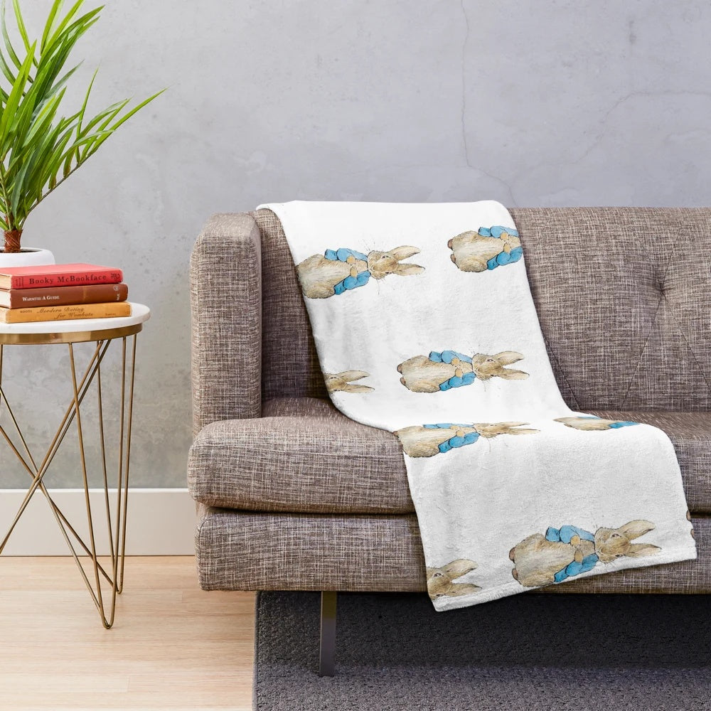 Soft, plush blanket featuring a Peter Rabbit-inspired design