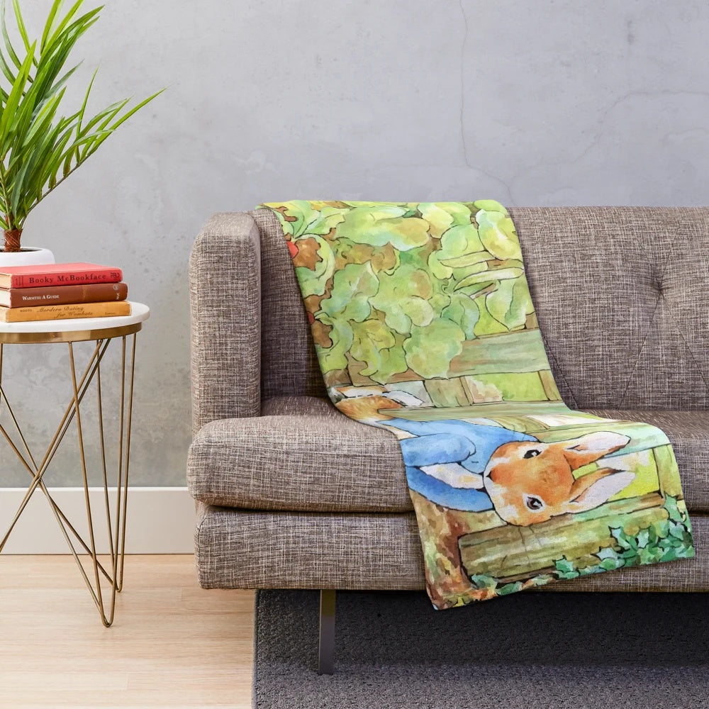 Soft and cuddly plush blanket featuring the charming Peter Rabbit character