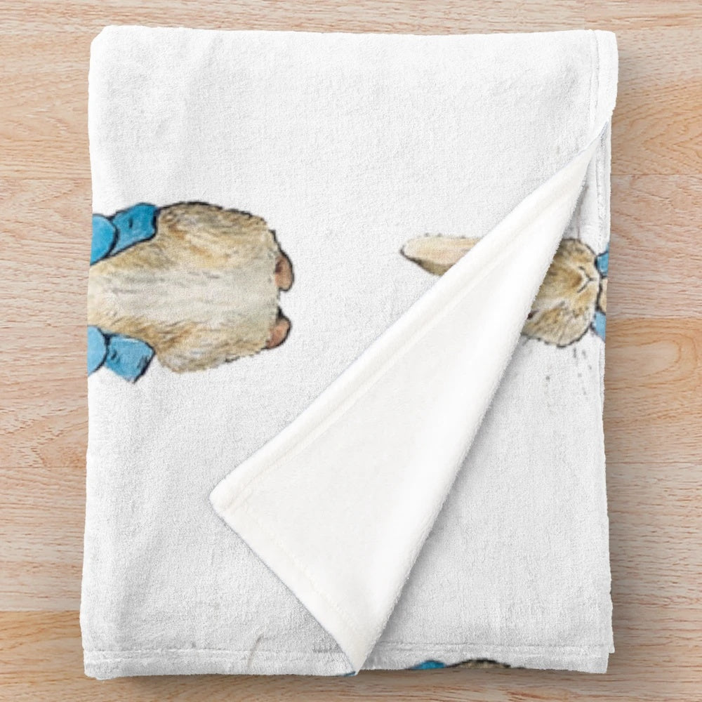 Soft, plush blanket featuring a Peter Rabbit-inspired design