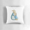 A soft, plush pillow featuring the iconic Peter Rabbit character from Beatrix Potter's timeless children's stories.