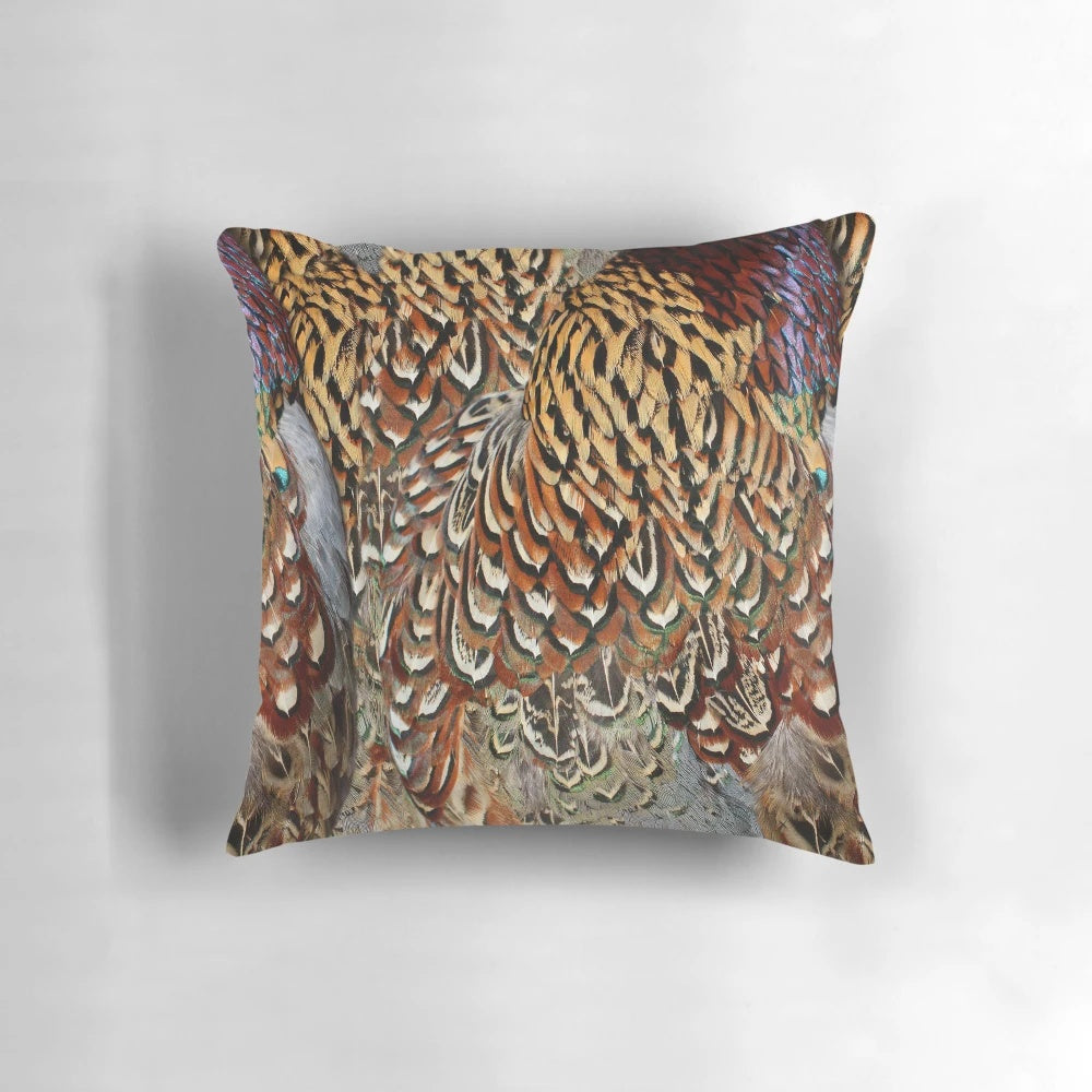 Soft, colorful pheasant feathers in a decorative Moose Disco pillow