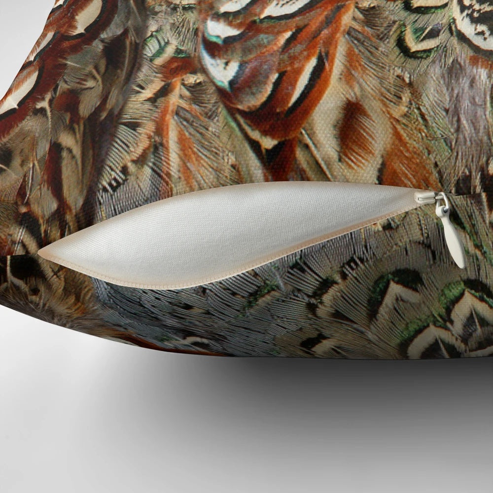 Soft, colorful pheasant feathers in a decorative Moose Disco pillow
