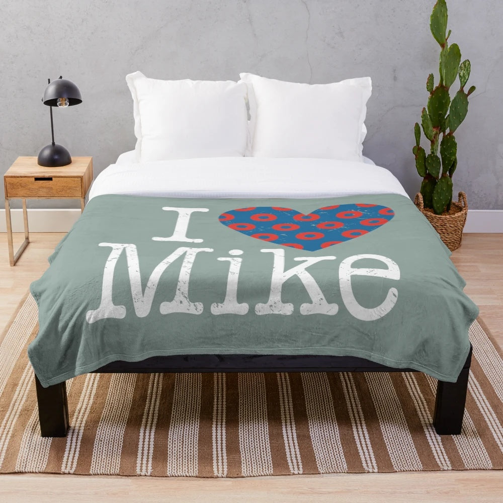 Phish-themed plush blanket featuring the band's iconic donut logo and "I Heart Mike" design