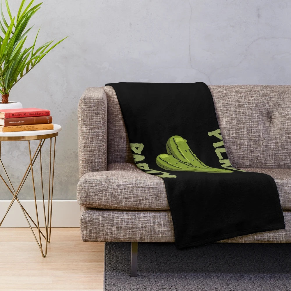 Pickle-themed plush blanket with cartoon design
