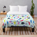 Pikmin themed plush blanket featuring Nintendo's iconic plant-like alien creatures