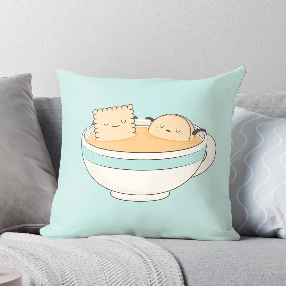 A soft, plush pillow with a cartoon design, perfect for sipping tea and relaxing.