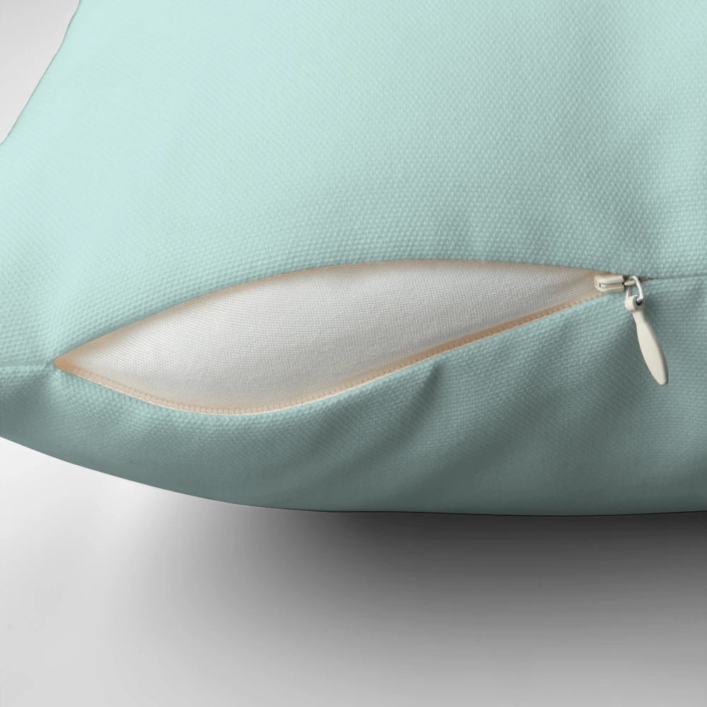 A soft, plush pillow with a cartoon design, perfect for sipping tea and relaxing.