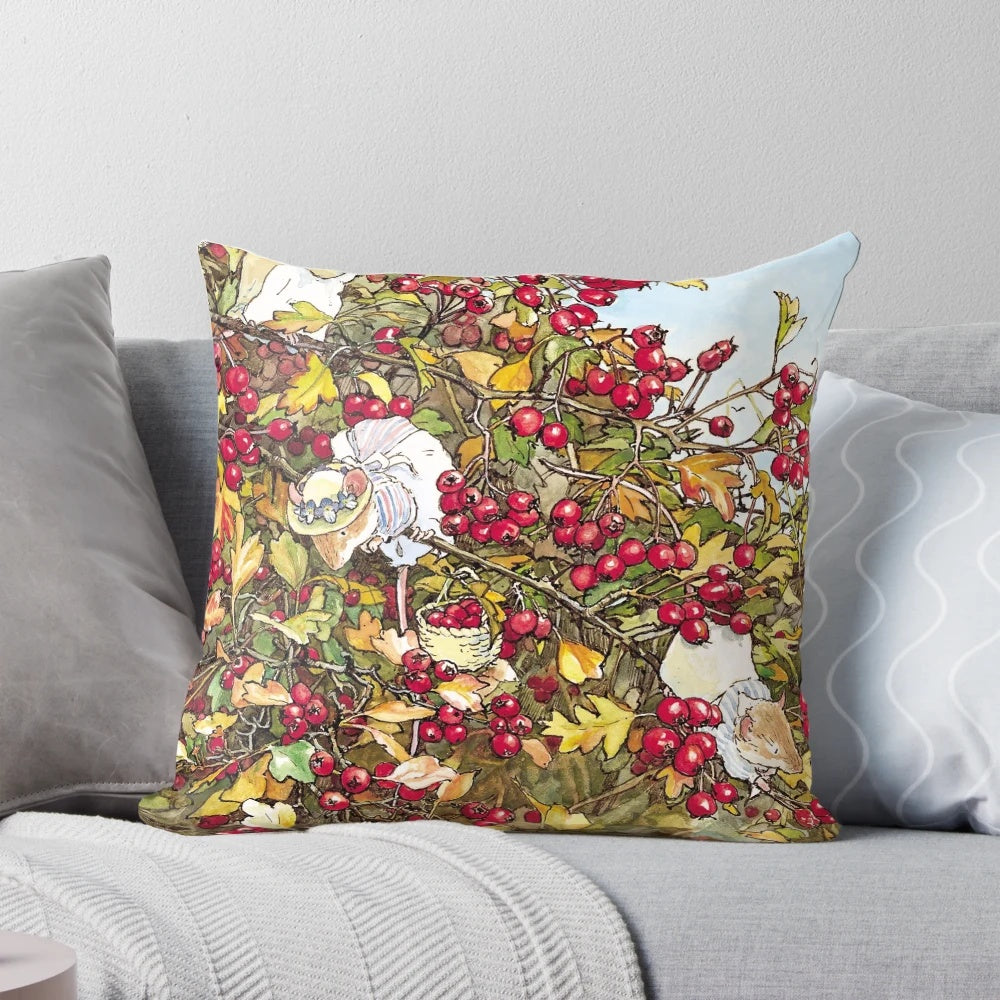 A plush pillow featuring a charming illustration of a blackthorn bush and berries, evoking the quintessential British countryside.