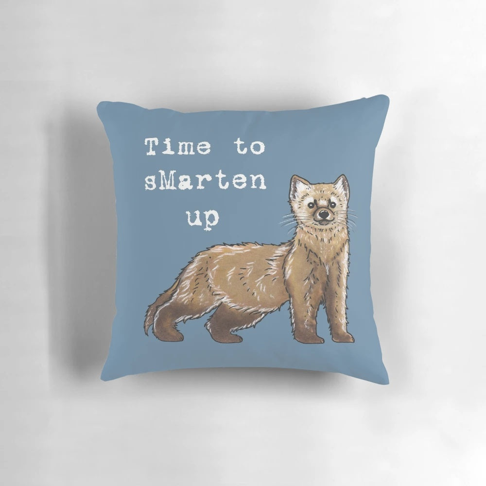 A soft, plush pillow featuring a cute and cuddly pine marten, a forest-dwelling weasel species.