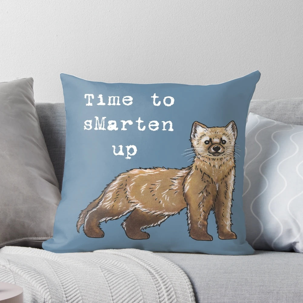 A soft, plush pillow featuring a cute and cuddly pine marten, a forest-dwelling weasel species.