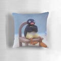 A soft, plush Pingu pillow - a comfy and decorative accent piece inspired by the popular British cartoon character.