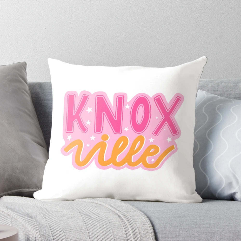 Pink and orange stars patterned pillow, perfect for Knoxville college dorm rooms and homes