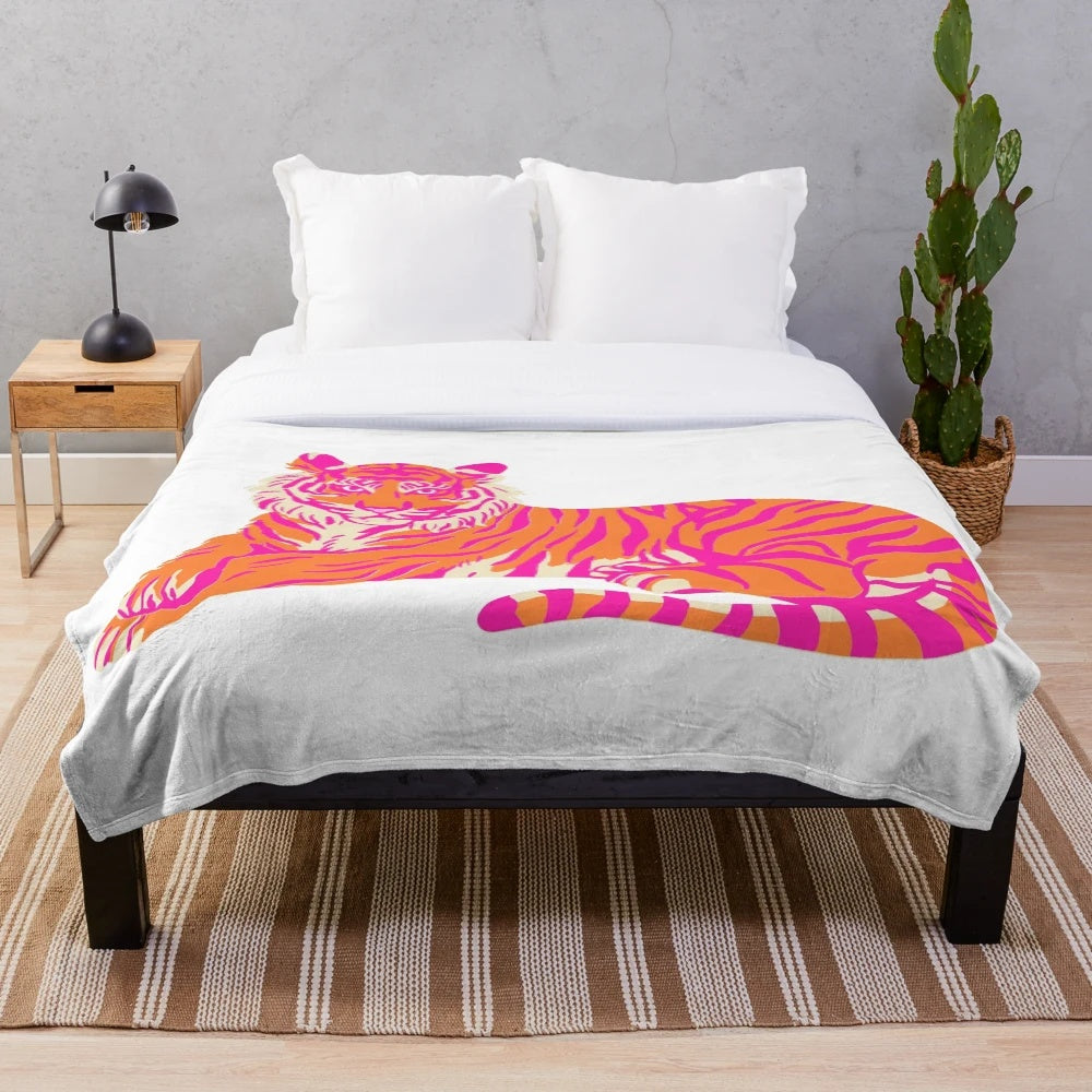 Pink and orange tiger patterned plush blanket