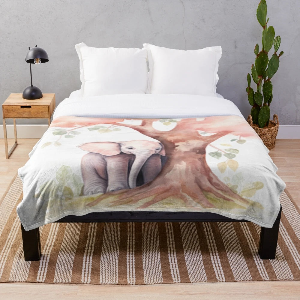 Pink elephant plush blanket with autumn tree design