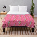 Pink lightning bolt plush blanket with a preppy design
