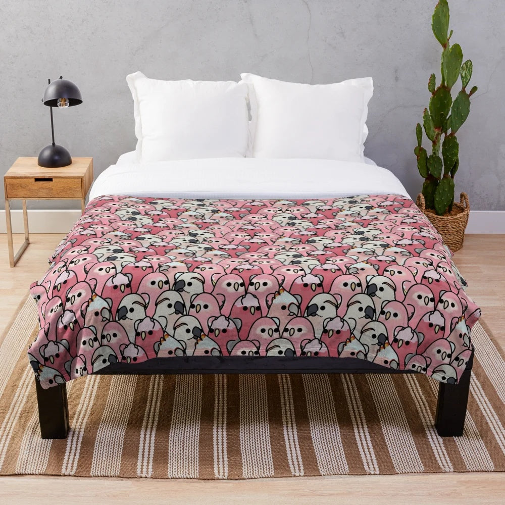 Pink parrot plush blanket with tropical bird design