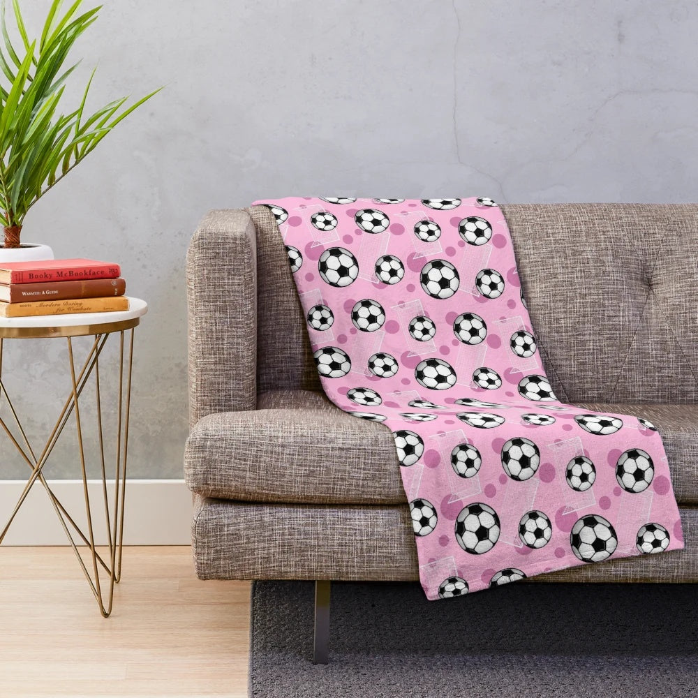 Pink soccer pattern plush blanket
