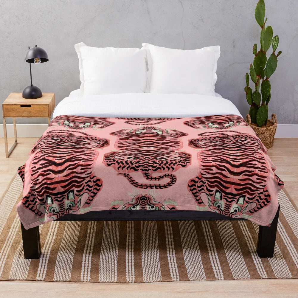 Soft and fluffy pink plush blanket with realistic tibetan tiger print design