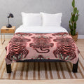 Soft and fluffy pink plush blanket with realistic tibetan tiger print design