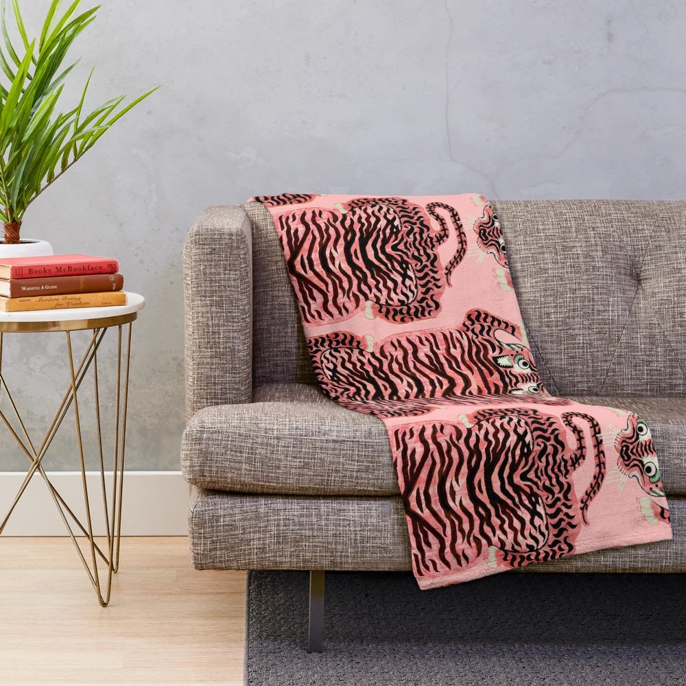 Soft and fluffy pink plush blanket with realistic tibetan tiger print design