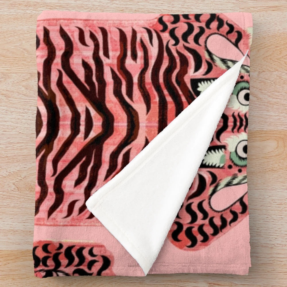 Soft and fluffy pink plush blanket with realistic tibetan tiger print design