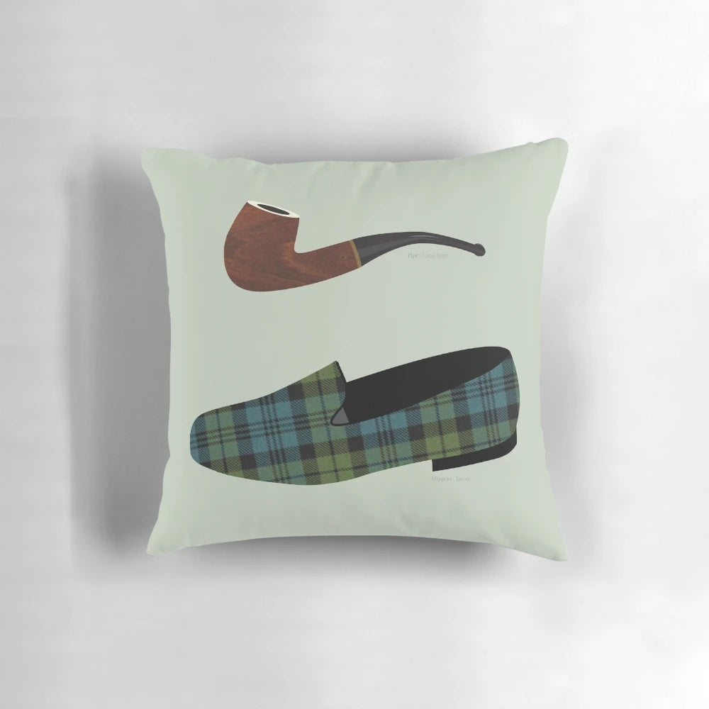 Soft, plush pillow featuring a pipe and tartan slippers design, perfect for creating a cozy, relaxing atmosphere.