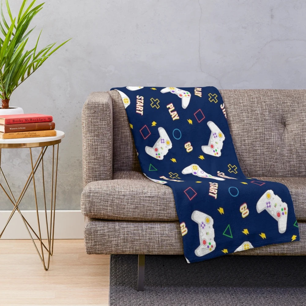 Plush video game patterns blanket with retro gaming controller designs