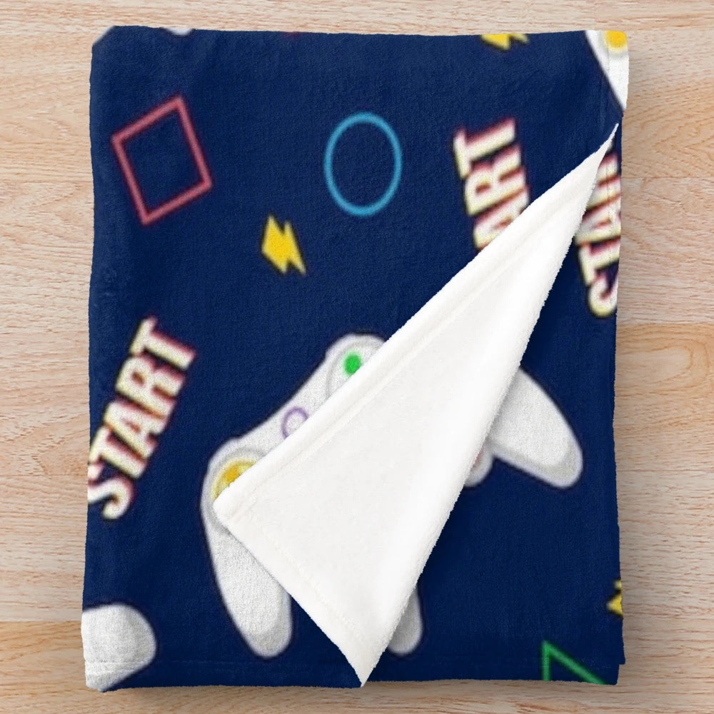 Plush video game patterns blanket with retro gaming controller designs