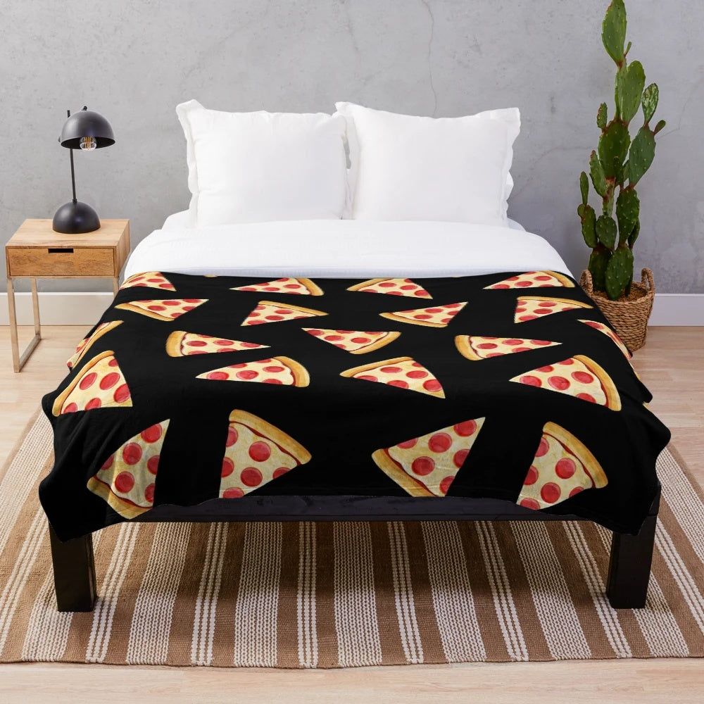 Plush pizza blanket featuring a pizza slice design on a black background
