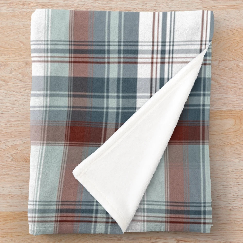 Cozy plaid textured blanket with a classic Scottish inspired design
