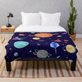 Planets pattern plush blanket showcasing the solar system