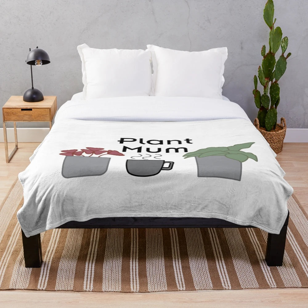 Soft, plush blanket featuring a plant design for plant lovers and enthusiasts