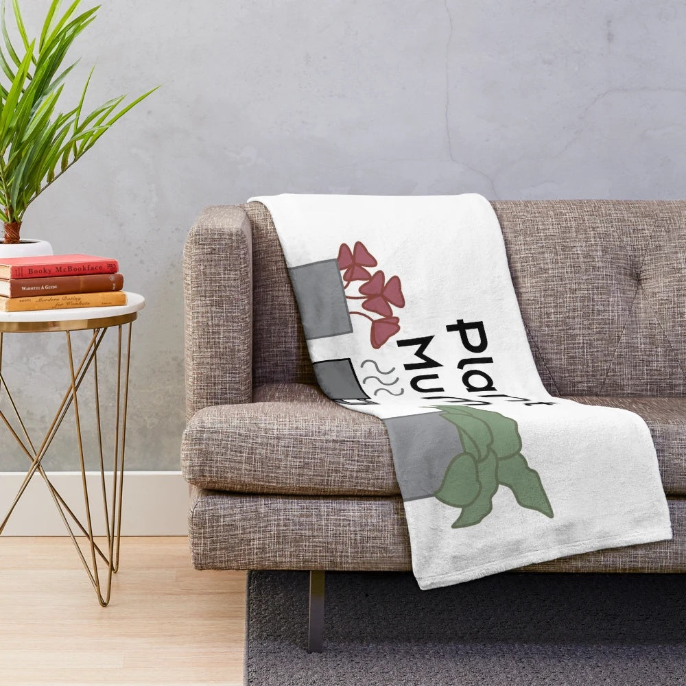 Soft, plush blanket featuring a plant design for plant lovers and enthusiasts