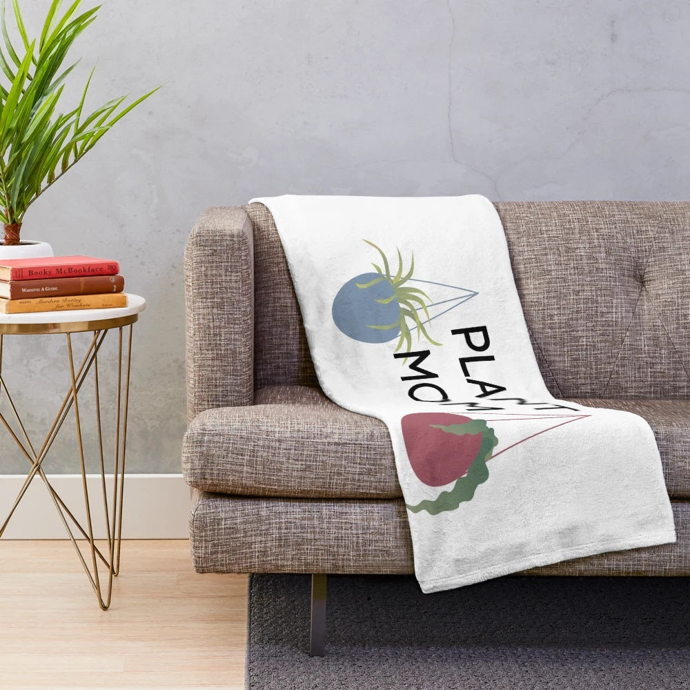 Soft and snuggly plush blanket featuring a plant mom design for plant enthusiasts