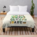 Plush blanket with a home is where my plants are design, featuring various houseplants and botanical elements