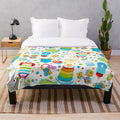 Soft and plush blanket in a playful design for adult comfort and relaxation
