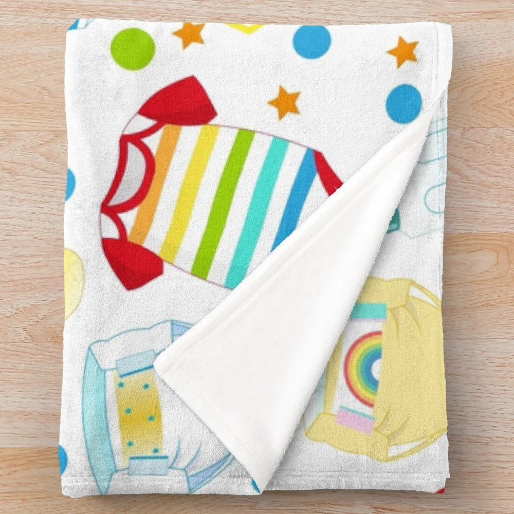 Soft and plush blanket in a playful design for adult comfort and relaxation