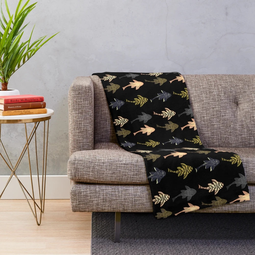 Soft and cuddly pleco plush blanket for aquarium enthusiasts