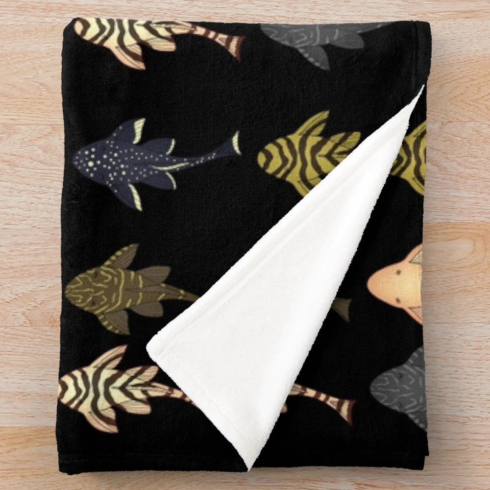 Soft and cuddly pleco plush blanket for aquarium enthusiasts