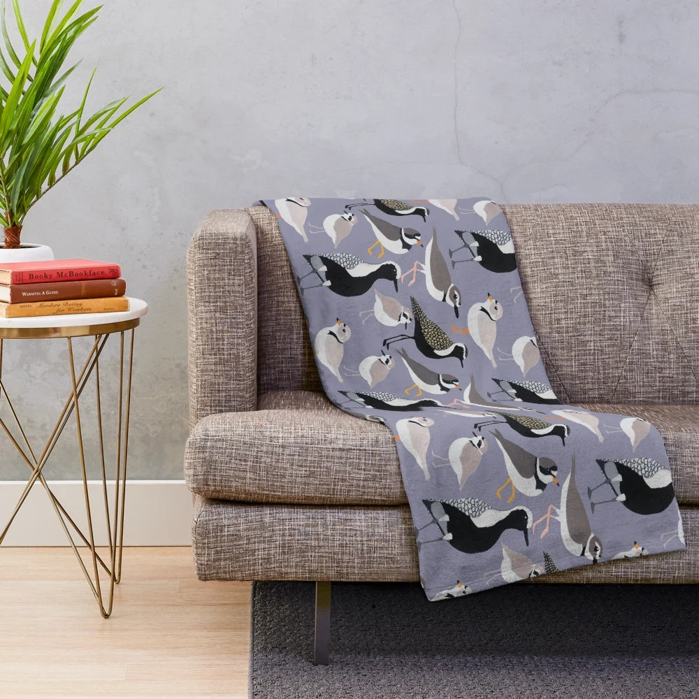 Plover-themed plush blanket featuring different species of plovers