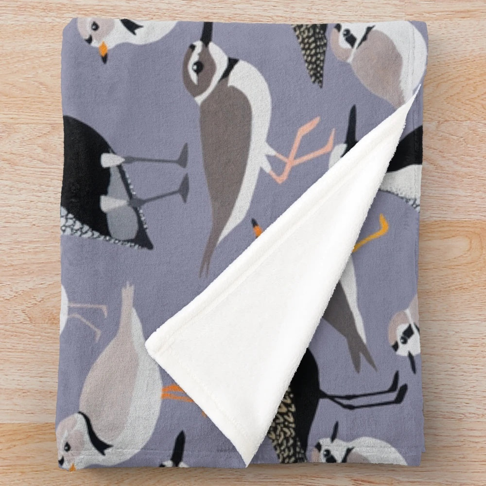 Plover-themed plush blanket featuring different species of plovers