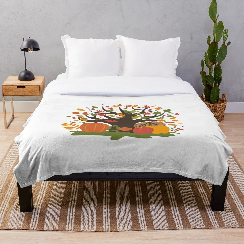 Soft, plush autumn-themed blanket with colorful leaves