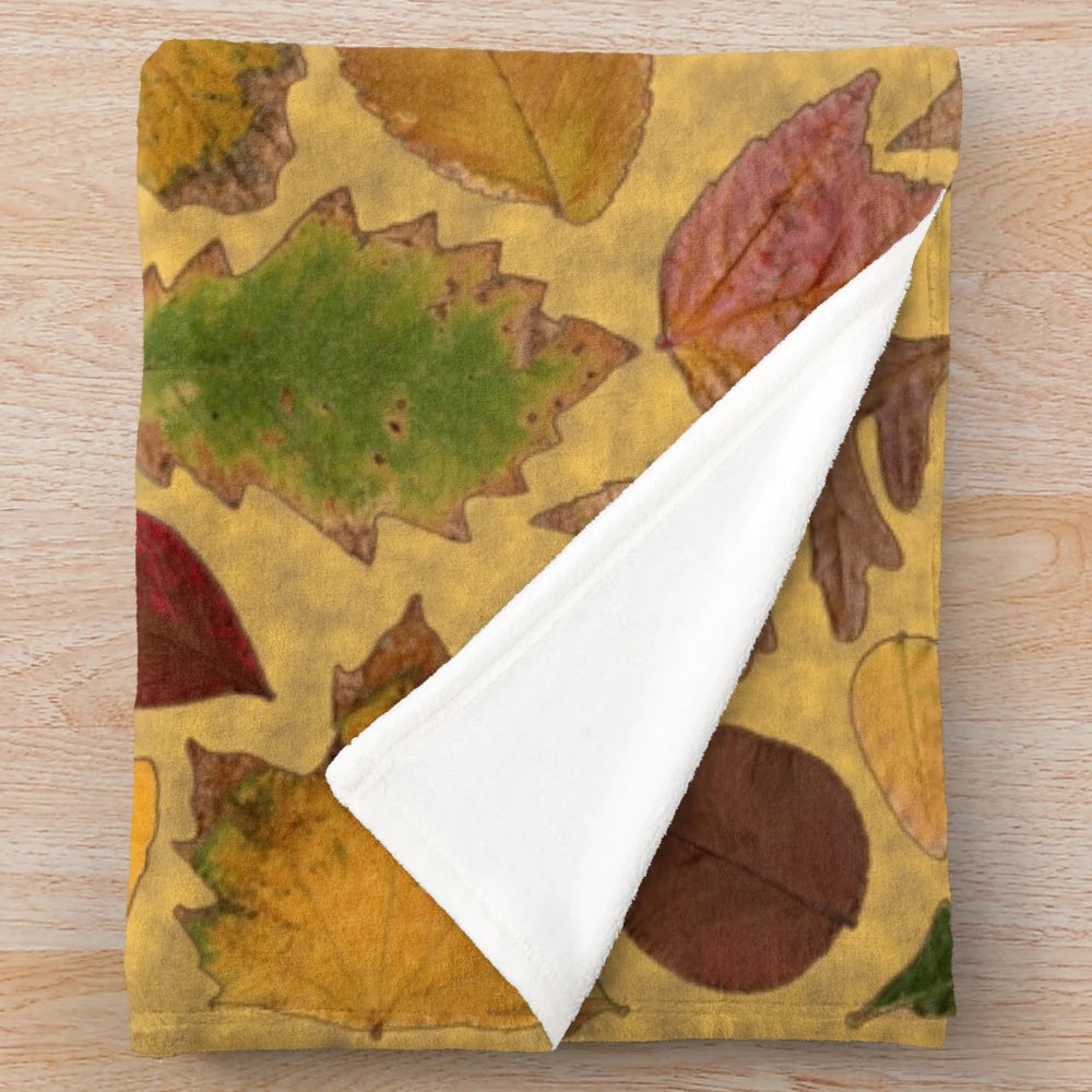 Soft and luxurious plush autumn blanket with vibrant fall colors