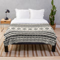 Plush Aztec-inspired patterned blanket in cream and black colors