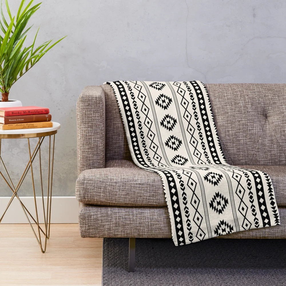 Plush Aztec-inspired patterned blanket in cream and black colors